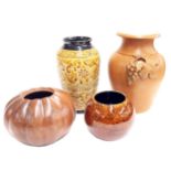 Four pieces of decorative pottery, including stoneware vase with incised foliate decoration on a