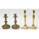 Pair of aesthetic pierced brass candlesticks, on detailed supports decorated with openwork foliate