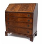 19th century mahogany bureau, the fall front enclosing a fitted interior with leather writing