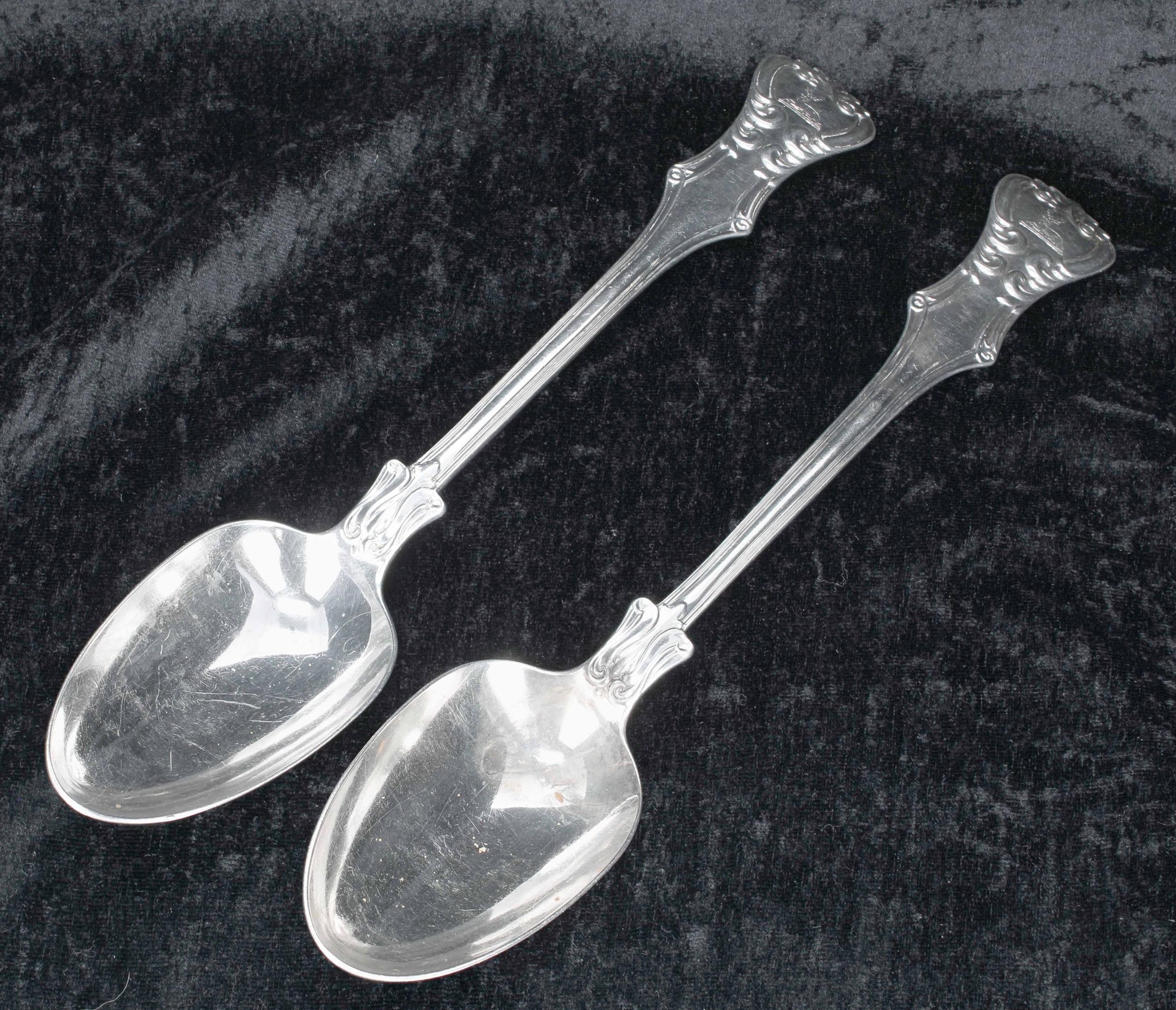 Pair of Victorian silver basting spoons, with deer crested handles, maker Charles Wallis, London