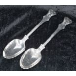 Pair of Victorian silver basting spoons, with deer crested handles, maker Charles Wallis, London