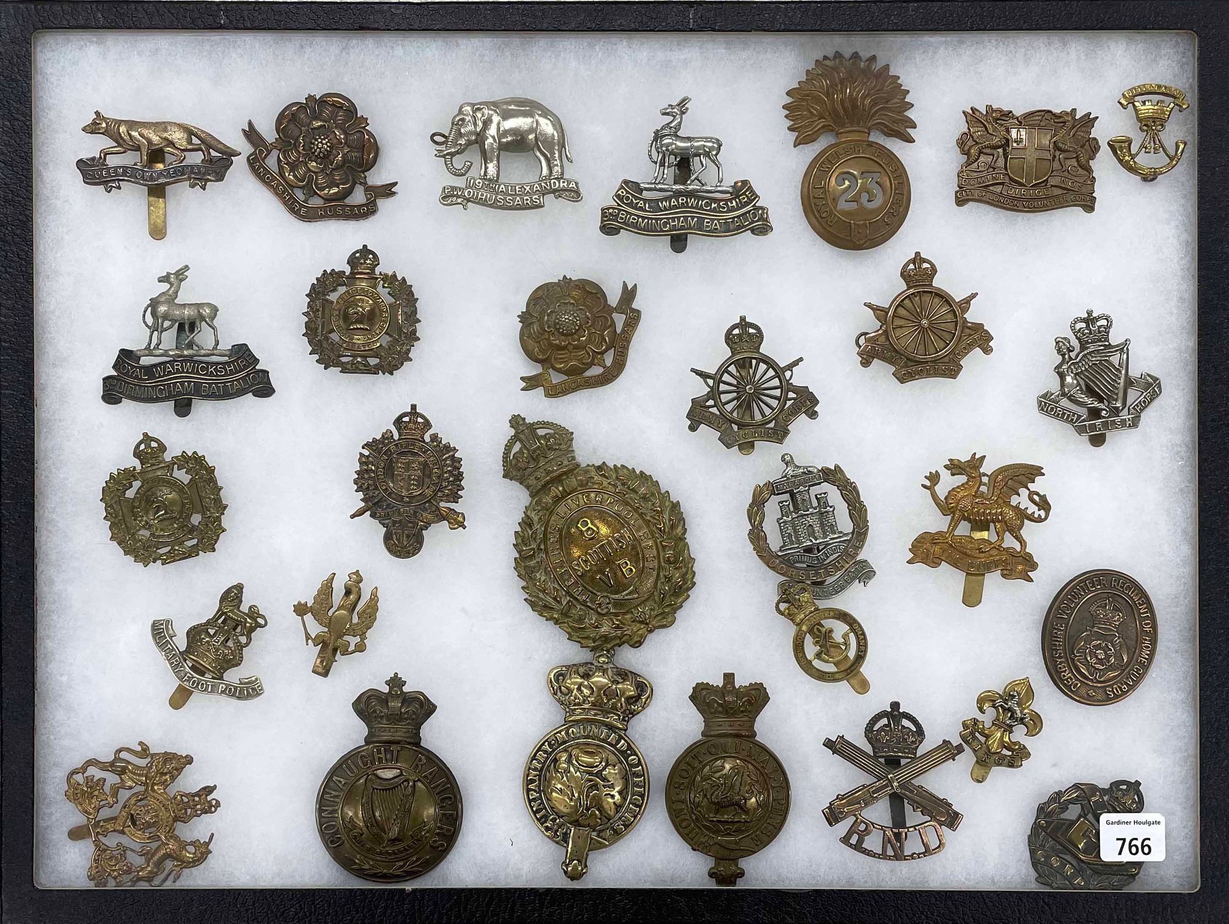 Military Regimental cap badges - collection of twenty-nine examples mounted in a display frame, 16.