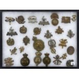 Military Regimental cap badges - collection of twenty-nine examples mounted in a display frame, 16.