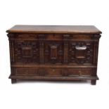 Late 17th century style oak mule chest, the moulded planked top with internal iron hinges over a