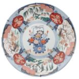 Japanese Imari porcelain charger, centrally decorated with jardiniere of flowers within panelled