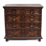 17th century and later English oak chest of drawers, the moulded top over four long geometric