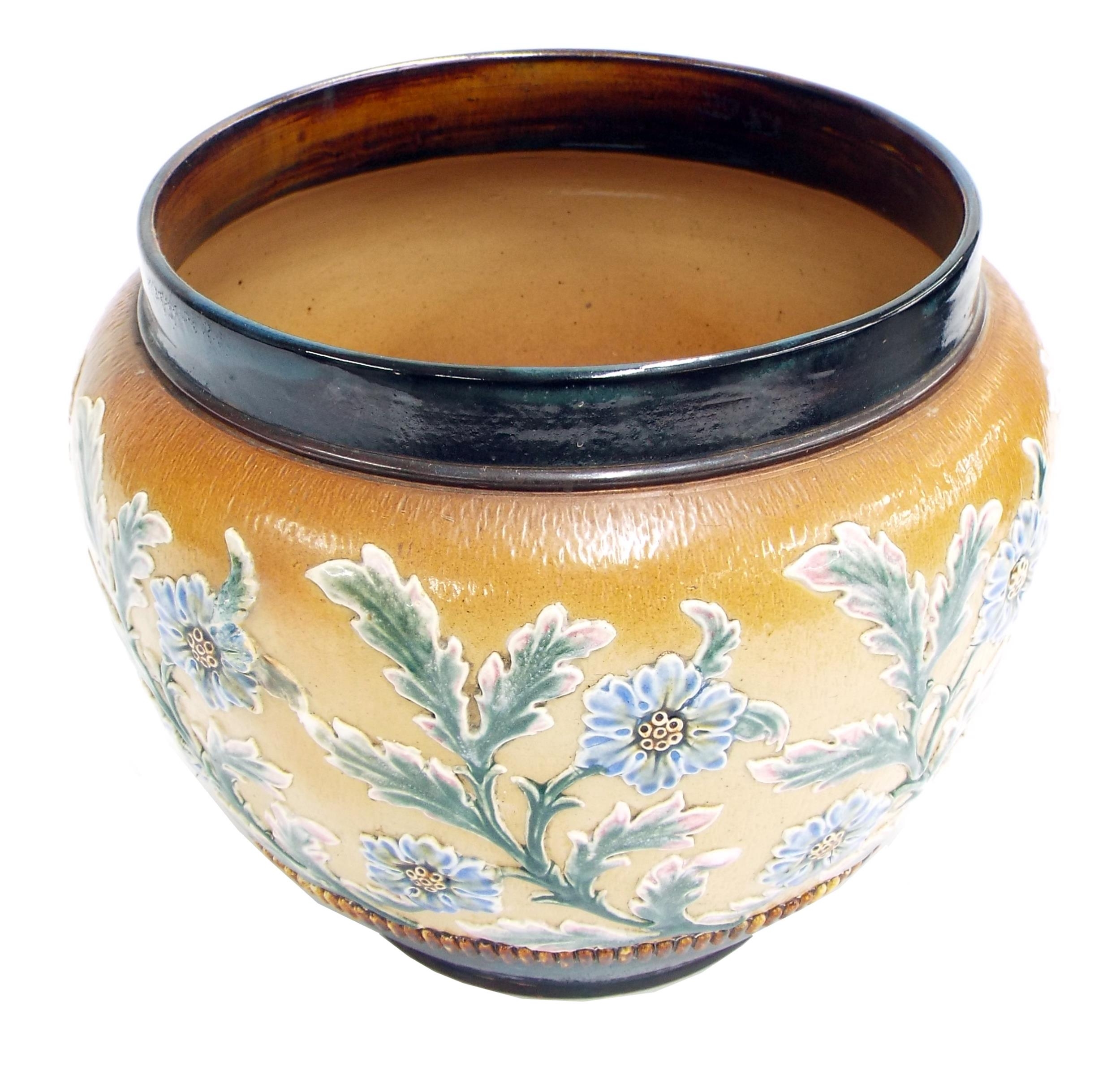 Doulton Lambeth stoneware pottery jardiniere, decorated with repeated raised moulded floral sprays