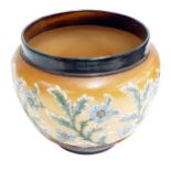 Doulton Lambeth stoneware pottery jardiniere, decorated with repeated raised moulded floral sprays