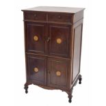 Early 20th century mahogany cupboard, with two drop flap compartments over two cupboard sections,