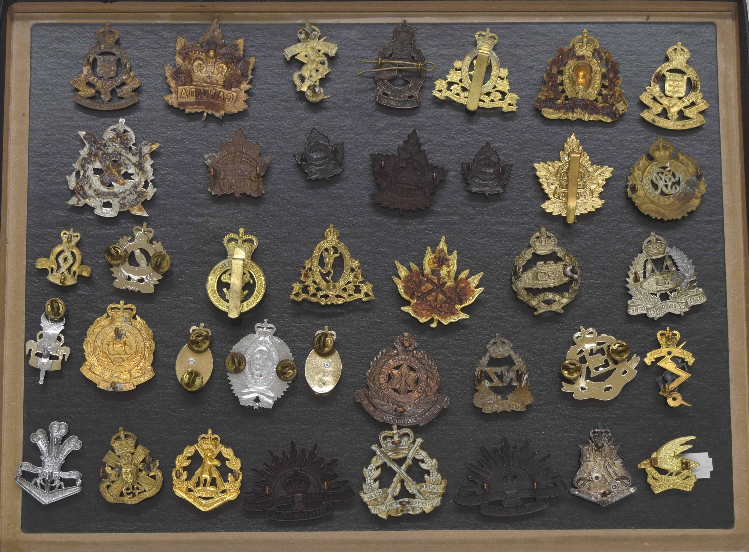 Military Regimental cap badges - collection of thirty-eight examples mounted in a display frame, - Image 2 of 2