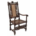 Charles II carved walnut and cane high-backed open armchair, the cresting rail carved with cherubs