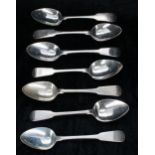 Seven similar Georgian silver fiddle pattern dessert spoons, two with rat tail to the underside of