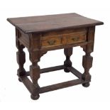 Late 17th century and later Dutch oak side table, the planked moulded top over a panelled frieze