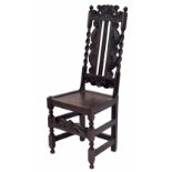 Late 17th century English high-backed carved oak side/hall chair, with crown and moulded C-scroll