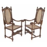 Pair of late 17th century and later Flemish walnut and cane high-backed open armchairs, with pierced