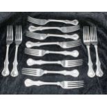 Twelve Victorian matched pattern Victorian silver dinner forks, seven by Charles Wallis, London