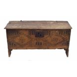 17th century small elm and oak fronted boarded chest, the moulded top over a geometric lozenge and