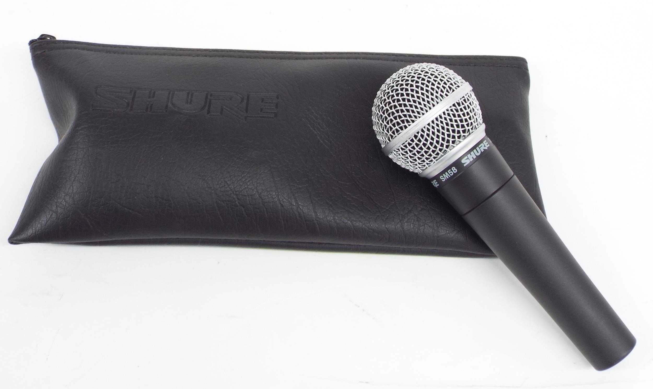 Shure SM58 microphone with pouch, clip and patch cable