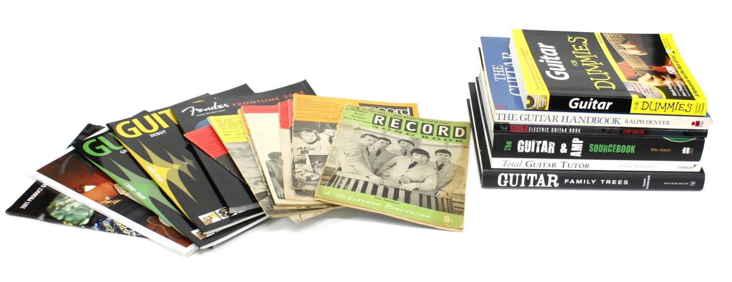 Selection of guitar books to include Mike Abbott's 'The Guitar & Amp Source Book', 'Guitar Family