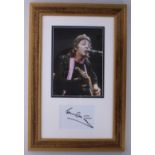 Paul McCartney - autographed page, framed and mounted beneath a colour picture, 23" x 15"