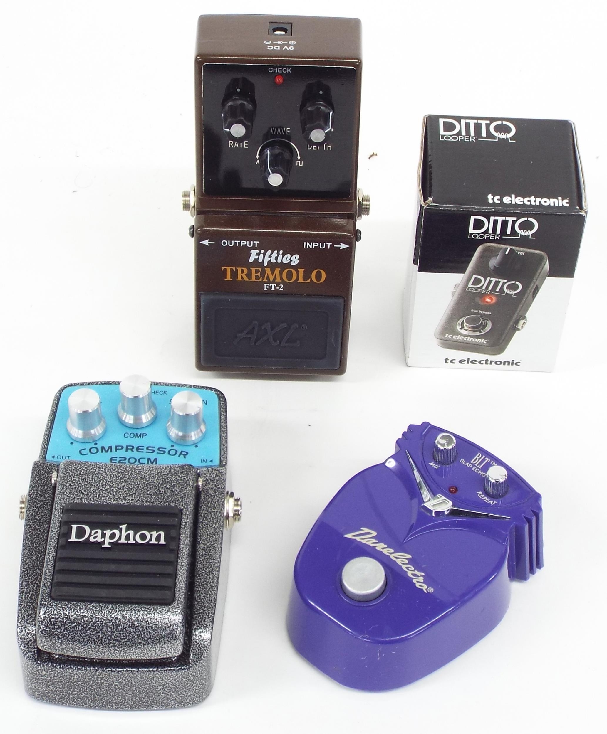 TC Electronic Ditto looper guitar pedal; together with a Daphon ET0CM compressor guitar pedal,