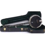 Fine contemporary Deering five string banjo, with ebony banded wooden resonator, 11" skin and mother