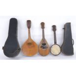 Neapolitan mandolin labelled Stridente...Napoli, case; also a Romanian pear shaped mandolin and a