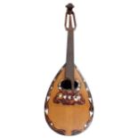 20th century Neapolitan style mandolin, with fluted bowl back and faux tortoiseshell and mother of