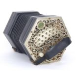 Fine Anglo concertina by and labelled Colin Dipper, no. 103, with thirty-four metal buttons on