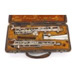 Silver plated metal Conservatoire system oboe, a copy of the Loree 1900 Patent, stamped Paul