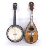 George Formby ukulele banjo, bearing the makers trade mark logo and stamped no. 1833 behind the