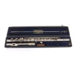 New Metal 1867 system flute with one piece body and foot joint, stamped Rudall Carte & Co Ltd, 23