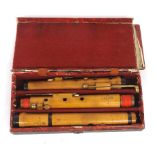 Boxwood flute with horn mounts and four brass keys, stamped (Hapsburg eagle), I W Lausmann, Linz,