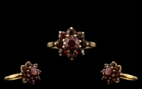 9ct Gold Garnet Set Ring, with a flower