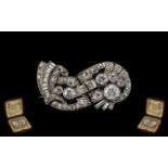 Art Deco Period 1930's Stunning Baguette and Brilliant Cut Diamond Set Brooch In Platinum. The