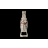 Coca Cola Bottle Opener. Cast metal Coca Cola bottle opener, 4.4" in length.