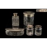 Collection of Silver Topped Glass Jars. Five items in total, fully hallmarked, largest being 9.