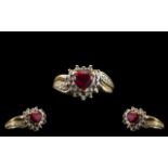 Ladies Attractive 9ct Two Tone Gold Heart Shaped Ruby Set Dress Ring. Full Hallmark for 9 ct - 375.