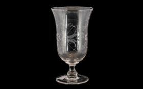 A Victorian Glass Celery Vase with etched decoration. Measures 8'' in height.