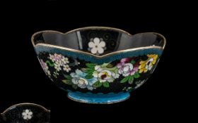 Chinese Cloisonne Shaped Bowl, decorated to the black enamel body with flowers and blossoms. Marks