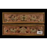 Pair of Antique Chinese Coat Cuff embroidered panels depicting a pair of Shishi dogs amongst