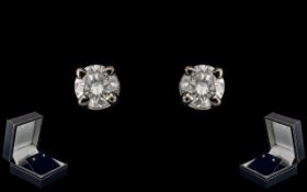 18ct Gold - Fine Pair of Diamond Set Stud Earrings. Marked 750 - 18ct. Est Diamond Weight 0.10 pts.