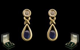 Ladies 9ct Gold Attractive Sapphire and Diamond Set Pair of Drop Earrings. Marked 9ct.