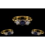 18ct Gold - Attractive 3 Stone Diamond and Sapphire Set Ring. Fully Hallmarked 18 .750. Ring Size M.