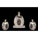 Silver Perfume Bottle. Silver perfume bottle decorated with amethysts, hallmarked for silver.