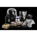 Collection of Star Wars Items, comprising: Storage tins x 4, a black and grey Darth Vader tin; a