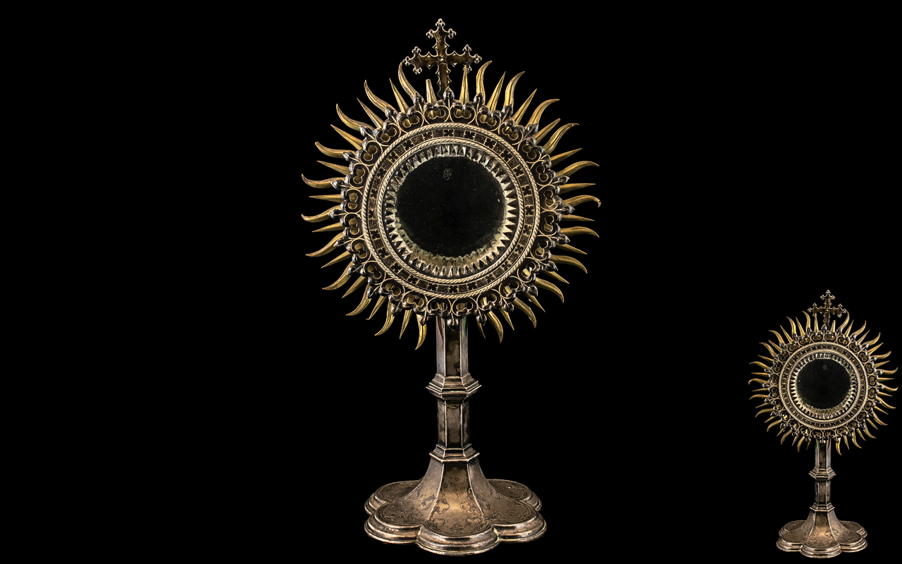 Antique Silvered Metal Ecclesiastical Monstrance of radiating sun burst form,