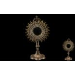 Antique Silvered Metal Ecclesiastical Monstrance of radiating sun burst form,