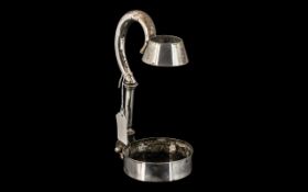 Edwardian Silver Plated Dog Collar Ratchet Wine Bottle Holder, the stand having a bottle neck