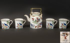 Oriental Style 'Mikado' Tea Pot and Mugs. Comprises, Oriental style tea pot with metal handle,